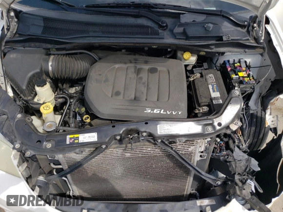 2013 Dodge Grand Caravan SE with VIN 2C4RDGBG3DR560962, listed as a Copart auction lot 53690225 with 124,796 mi miles and Salvage Title. Bid and sale history available at DreamBid. Image 12.