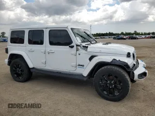2021 Jeep Wrangler Unlimited Sahara with VIN 1C4JJXP63MW807717, listed as a Copart auction lot 59731465 with 50,799 mi miles and Clean title. Bid and sale history available at DreamBid. Image 4.