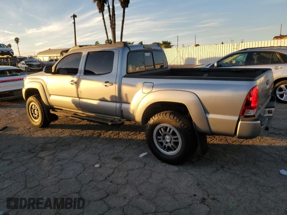 2014 Toyota Tacoma PreRunner with VIN 3TMKU4HNXEM041311, listed as a Copart auction lot 84065684 with 212,473 mi miles and Salvage title. Bid and sale history available at DreamBid. Image 2.
