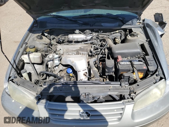 1999 Toyota Camry LE с VIN JT2BG22KXX0284593, выставлен на аукционе Copart как лот 54061685 с пробегом 229 047 миль миль и Списание • Salvage title. История ставок и продаж доступна на DreamBid. Изображение 11.