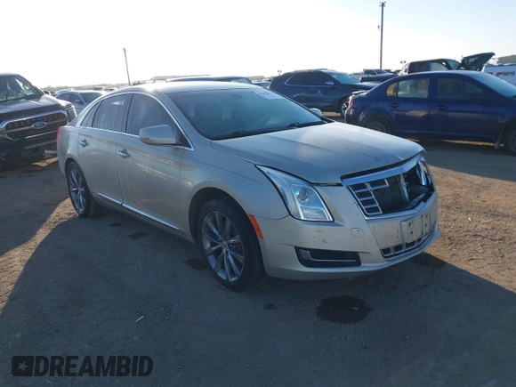 2014 Cadillac XTS with VIN 2G61L5S30E9207777, listed as a IAAI auction lot 41202654 with 112,565 mi miles. Bid and sale history available at carsss.com. Image 1.
