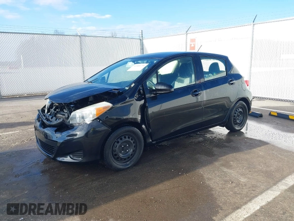 2014 Toyota Yaris L with VIN JTDKTUD36ED586456, listed as a IAAI auction lot 41888730 with 92,742 mi miles. Bid and sale history available at carsss.com. Image 2.