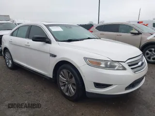 2010 Ford Taurus Limited z VIN 1FAHP2JW0AG151321, wystawiony jako IAAI lot #41969104 z przebiegiem 213 817 mil mil oraz . Historia ofert i sprzedaży dostępna na DreamBid. Obrazek 1.