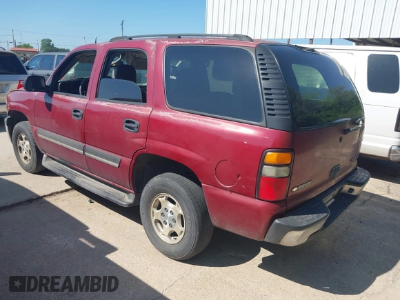 2005 Chevrolet Tahoe LT with VIN 1GNEC13TX5J210767, listed as a IAAI auction lot 42520436 with 528,704 mi miles and . Bid and sale history available at DreamBid. Image 3.