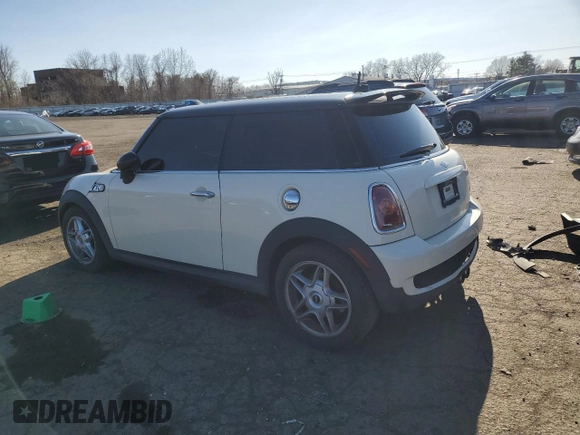 2007 MINI Hardtop S with VIN WMWMF73577TT86065, listed as a Copart auction lot 57262795 with 100,052 mi miles and Salvage Title. Bid and sale history available at DreamBid. Image 2.