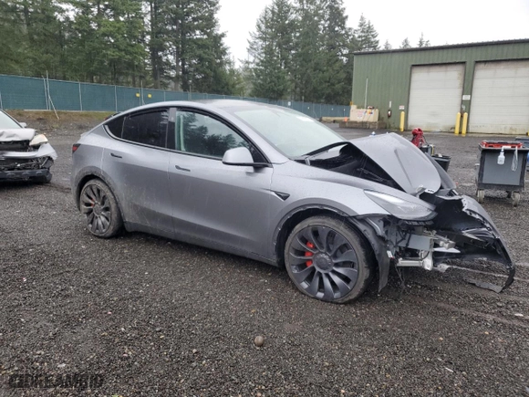 2025 Tesla Model Y Performance with VIN 7SAYGDEF2SF232223, listed as a Copart auction lot 50419235 with 0 mi miles and Salvage Title. Bid and sale history available at carsss.com. Image 4.