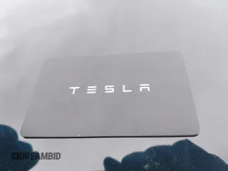2023 Tesla Model Y Long Range with VIN 7SAYGDEE6PF824173, listed as a IAAI auction lot 41728613 with Not Provided miles and . Bid and sale history available at DreamBid. Image 11.