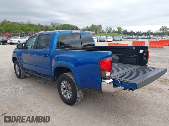 2018 Toyota Tacoma SR5 with VIN 3TMAZ5CNXJM069212, listed as a IAAI auction lot 42010564 with 73,825 mi miles and . Bid and sale history available at DreamBid. Image 3.
