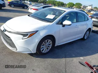 2024 Toyota Corolla Hybrid LE with VIN JTDBCMFE2RJ031865, listed as a IAAI auction lot 41602715 with 10,892 mi miles. Bid and sale history available at carsss.com. Image 17.