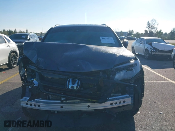 2022 Honda Pilot Special Edition with VIN 5FNYF5H25NB031399, listed as a IAAI auction lot 41638517 with 34,239 mi miles and . Bid and sale history available at carsss.com. Image 13.