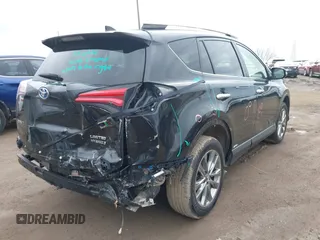 2017 Toyota RAV4 Hybrid Limited with VIN JTMDJREV7HD136797, listed as a IAAI auction lot 41733609 with 131,162 mi miles. Bid and sale history available at carsss.com. Image 4.