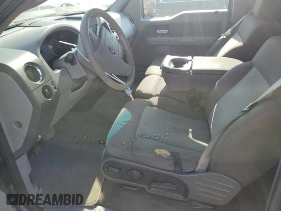 2006 Ford F-150 STX с VIN 1FTRX12W06NA46790, выставлен на аукционе Copart как лот 56589565 с пробегом 246 021 миль миль и Списание • Salvage title. История ставок и продаж доступна на DreamBid. Изображение 7.
