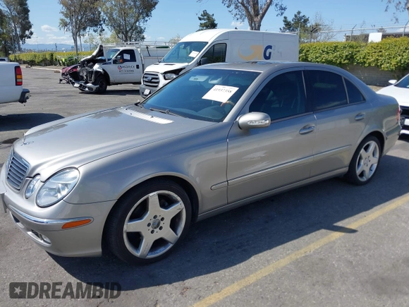 2003 Mercedes-Benz E-Class 3.2L with VIN WDBUF65J63X103423, listed as a IAAI auction lot 41937358 with 151,439 mi miles. Bid and sale history available at carsss.com. Image 2.