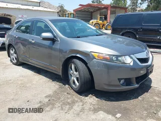2010 Acura TSX z VIN JH4CU2F64AC033946, wystawiony jako IAAI lot #42544399 z przebiegiem 120 477 mil mil oraz . Historia ofert i sprzedaży dostępna na DreamBid. Obrazek 1.