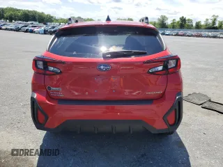 2024 Subaru Crosstrek Premium с VIN JF2GUADC4R8247552, выставлен на аукционе Copart как лот 59092285 с пробегом 23 578 миль миль и Списание • Salvage title. История ставок и продаж доступна на DreamBid. Изображение 6.