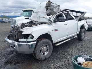 2011 Ram 2500 Laramie Longhorn with VIN 3D7UT2CL4BG589116, listed as a IAAI auction lot 41950008 with 132,282 mi miles and . Bid and sale history available at DreamBid. Image 2.