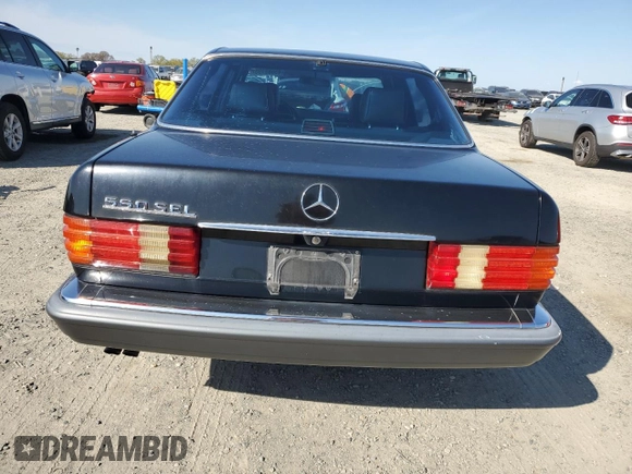 1989 Mercedes-Benz 560 with VIN WDBCA39D8KA437872, listed as a Copart auction lot 45689195 with 151,851 mi miles and Clean Title. Bid and sale history available at DreamBid. Image 6.