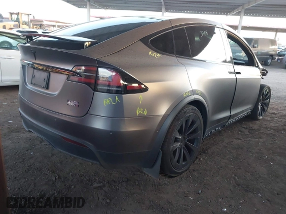 2022 Tesla Model X Plaid z VIN 7SAXCBE69NF352875, wystawiony jako IAAI lot #41964970 z przebiegiem 34 065 mil mil oraz . Historia ofert i sprzedaży dostępna na DreamBid. Obrazek 4.