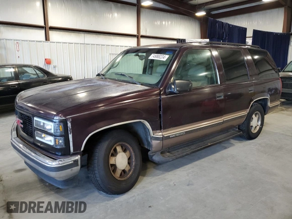 1997 GMC Yukon with VIN 1GKEC13R2VJ734299, listed as a Copart auction lot 74988224 with 225,335 mi miles and Salvage Title. Bid and sale history available at carsss.com. Image 1.