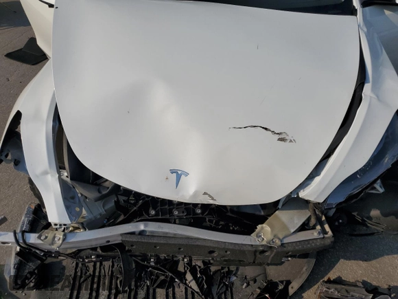 2024 Tesla Model Y Long Range with VIN 7SAYGAEEXRF109995, listed as a Copart auction lot 55160345 with Not provided miles and Salvage title. Bid and sale history available at DreamBid. Image 12.