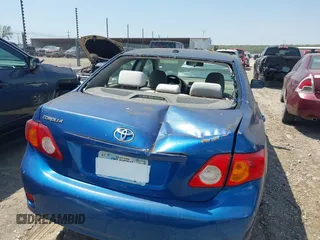 2009 Toyota Corolla with VIN JTDBL40E799044489, listed as a IAAI auction lot 42053660 with 186,356 mi miles. Bid and sale history available at carsss.com. Image 6.