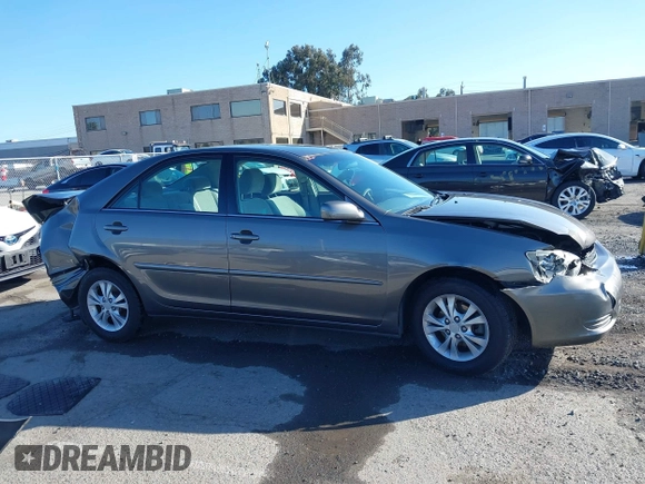 2004 Toyota Camry LE with VIN 4T1BF30K94U577260, listed as a IAAI auction lot 41906287 with 68,499 mi miles. Bid and sale history available at carsss.com. Image 14.