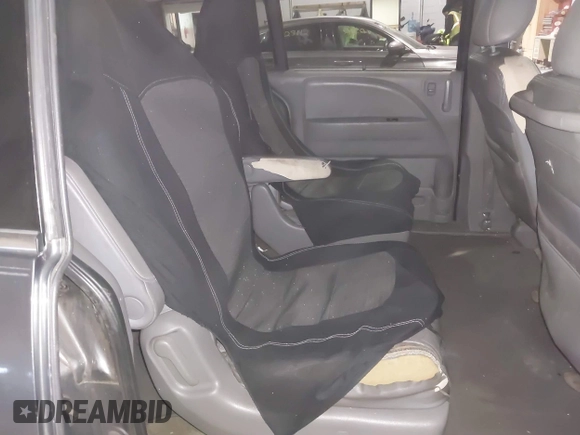 2010 Honda Odyssey EX-L with VIN 5FNRL3H78AB030111, listed as a IAAI auction lot 41250121 with 333,030 mi miles and . Bid and sale history available at DreamBid. Image 8.