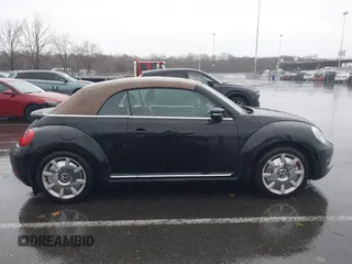 2013 Volkswagen Beetle 2.5L with VIN 3VW5P7AT8DM832656, listed as a IAAI auction lot 41729356 with 124,156 mi miles and . Bid and sale history available at DreamBid. Image 12.
