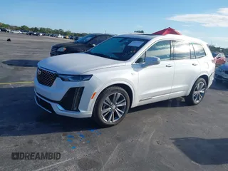 2025 Cadillac XT6 FWD Premium Luxury with VIN 1GYKPCRS9SZ122102, listed as a IAAI auction lot 41677275 with 4,227 mi miles. Bid and sale history available at carsss.com. Image 2.