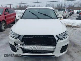 2017 Audi Q3 Premium z VIN WA1BCCFS4HR016424, wystawiony jako IAAI lot #41627278 z przebiegiem 60 028 mil mil oraz . Historia ofert i sprzedaży dostępna na DreamBid. Obrazek 12.
