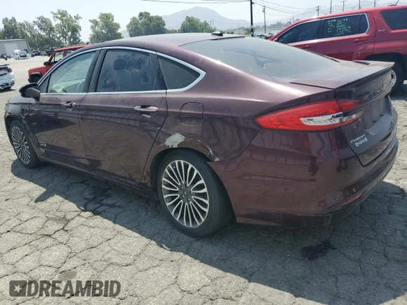 2017 Ford Fusion Titanium z VIN 3FA6P0SU8HR313773, wystawiony jako Copart lot #58791695 z przebiegiem 141 777 mil mil oraz Czysty tytuł • Clean title. Historia ofert i sprzedaży dostępna na DreamBid. Obrazek 2.