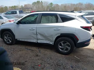 2023 Hyundai Tucson SEL with VIN 5NMJBCAE2PH190887, listed as a IAAI auction lot 41800623 with 32,187 mi miles and . Bid and sale history available at DreamBid. Image 14.