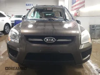 2009 Kia Sportage LX with VIN KNDJF724997571437, listed as a Copart auction lot 51460335 with 161,468 mi miles and Salvage Title. Bid and sale history available at carsss.com. Image 5.