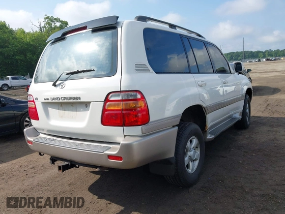 2000 Toyota Land Cruiser z VIN JT3HT05J4Y0084531, wystawiony jako IAAI lot #42381507 z przebiegiem 184 478 mil mil oraz . Historia ofert i sprzedaży dostępna na DreamBid. Obrazek 4.