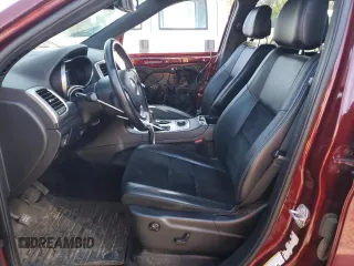 2018 Jeep Grand Cherokee Laredo E with VIN 1C4RJFAG1JC130386, listed as a Copart auction lot 52999085 with 69,304 mi miles and Salvage Title. Bid and sale history available at DreamBid. Image 7.