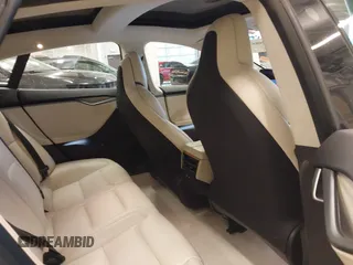 2018 Tesla Model S 75D with VIN 5YJSA1E24JF276044, listed as a IAAI auction lot 41798530 with 53,462 mi miles and . Bid and sale history available at DreamBid. Image 8.