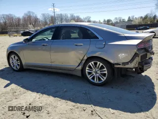 2015 Lincoln MKZ Hybrid with VIN 3LN6L2LU9FR612049, listed as a Copart auction lot 50943365 with 151,602 mi miles and Salvage Title. Bid and sale history available at DreamBid. Image 2.