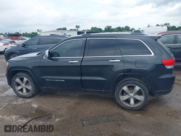 2015 Jeep Grand Cherokee Overland with VIN 1C4RJECG1FC769950, listed as a IAAI auction lot 42405712 with 217,514 mi miles and . Bid and sale history available at DreamBid. Image 14.