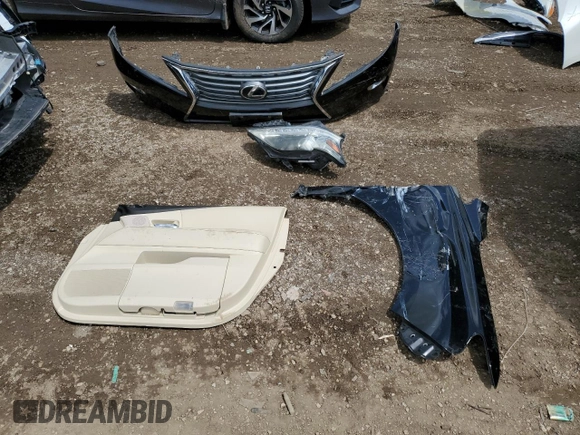 2015 Lexus RX 350 with VIN 2T2BK1BA5FC300853, listed as a Copart auction lot 58793175 with 128,716 mi miles and Salvage title. Bid and sale history available at DreamBid. Image 12.