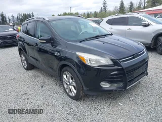 2014 Ford Escape Titanium with VIN 1FMCU9J95EUD60587, listed as a IAAI auction lot 42129854 with 155,559 mi miles and . Bid and sale history available at DreamBid. Image 1.