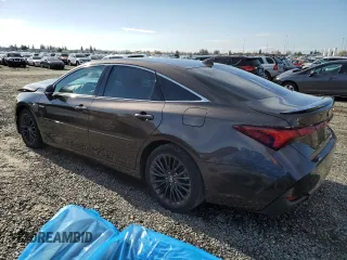 2019 Toyota Avalon Limited Hybrid z VIN 4T1B21FBXKU003688, wystawiony jako Copart lot #69697502 z przebiegiem 48 950 mil mil oraz . Historia ofert i sprzedaży dostępna na DreamBid. Obrazek 2.