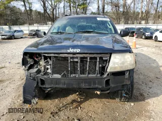 2003 Jeep Grand Cherokee Laredo with VIN 1J4GX48S43C609354, listed as a Copart auction lot 43924595 with 212,949 mi miles and Salvage Title. Bid and sale history available at carsss.com. Image 5.