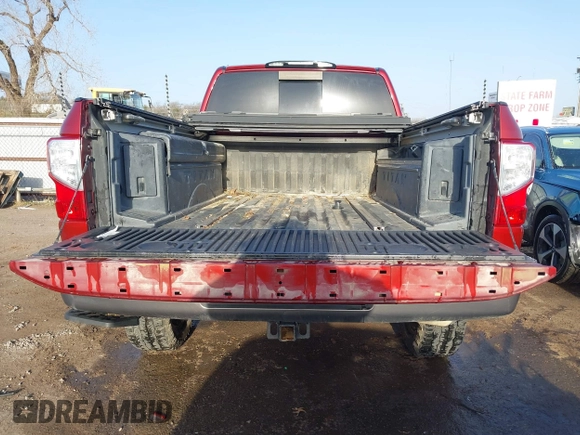 2017 Nissan Titan Pro-4X z VIN 1N6BA1F43HN562377, wystawiony jako IAAI lot #41786607 z przebiegiem 95 207 mil mil oraz . Historia ofert i sprzedaży dostępna na DreamBid. Obrazek 17.