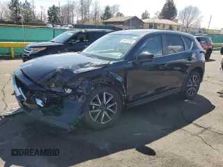 2018 Mazda CX-5 Touring with VIN JM3KFBCM4J0466234, listed as a Copart auction lot 51617095 with 58,200 mi miles and Salvage Title. Bid and sale history available at carsss.com. Image 1.