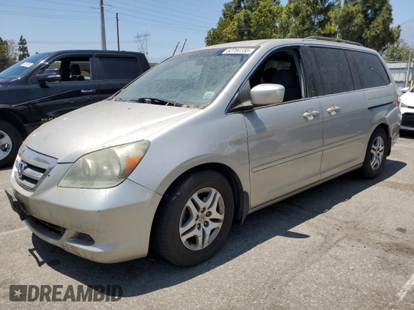 2006 Honda Odyssey EX with VIN 5FNRL38406B453939, listed as a Copart auction lot 62784155 with 86,635 mi miles and Clean title. Bid and sale history available at DreamBid. Image 1.
