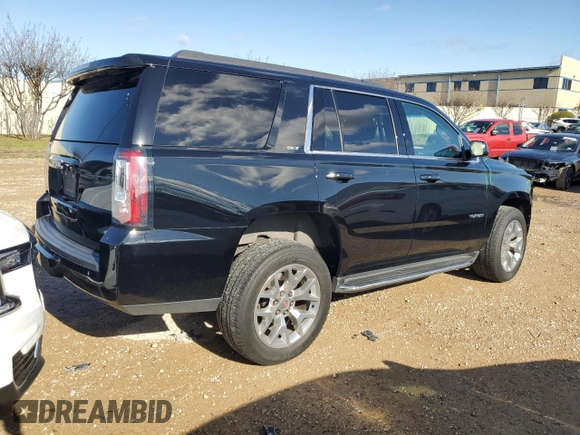 2019 GMC Yukon SLT with VIN 1GKS1BKC0KR321175, listed as a Copart auction lot 84092224 with 99,711 mi miles and Salvage Title. Bid and sale history available at carsss.com. Image 3.