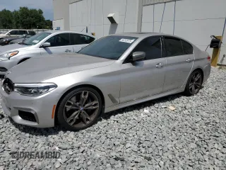 2019 BMW 5 Series M550i xDrive with VIN WBAJB9C53KB464902, listed as a Copart auction lot 54252875 with 45,157 mi miles and Salvage title. Bid and sale history available at DreamBid. Image 1.