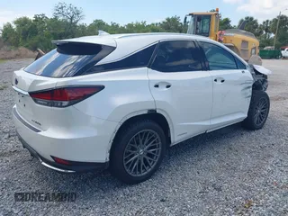 2021 Lexus RX with VIN 2T2JGMDA9MC058061, listed as a IAAI auction lot 42031419 with 40,698 mi miles. Bid and sale history available at carsss.com. Image 4.