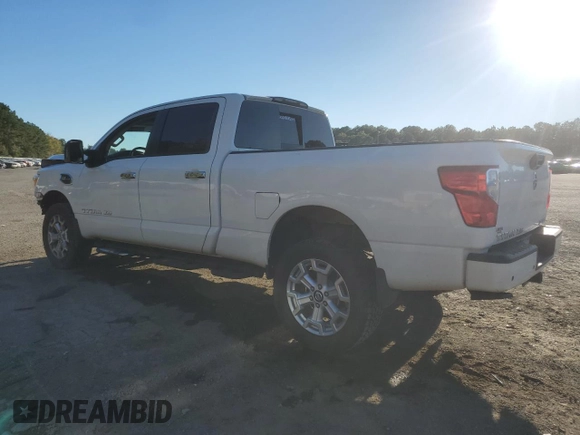 2021 Nissan Titan SV z VIN 1N6AA1FB8MN504530, wystawiony jako Copart lot #80914794 z przebiegiem 103 771 mil mil oraz Szkoda całkowita • Salvage title. Historia ofert i sprzedaży dostępna na DreamBid. Obrazek 2.