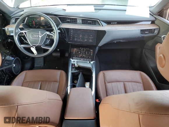 2023 Audi e-tron Premium with VIN WA1AAAGE3PB023323, listed as a Copart auction lot 69809524 with 31,564 mi miles and Salvage Title. Bid and sale history available at DreamBid. Image 8.